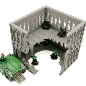 Grey 3D printed gothic ruins tabletop terrain shown with miniature soldiers and a vehicle for scale