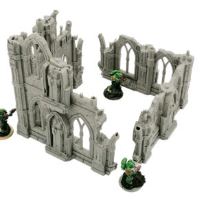 Grey 3D-printed gothic ruin terrain for tabletop gaming, shown with green miniatures for scale