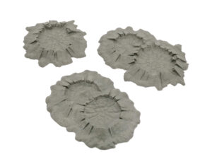 Grey unpainted 3D-printed miniature crater terrain pieces for tabletop gaming, showing single and double designs
