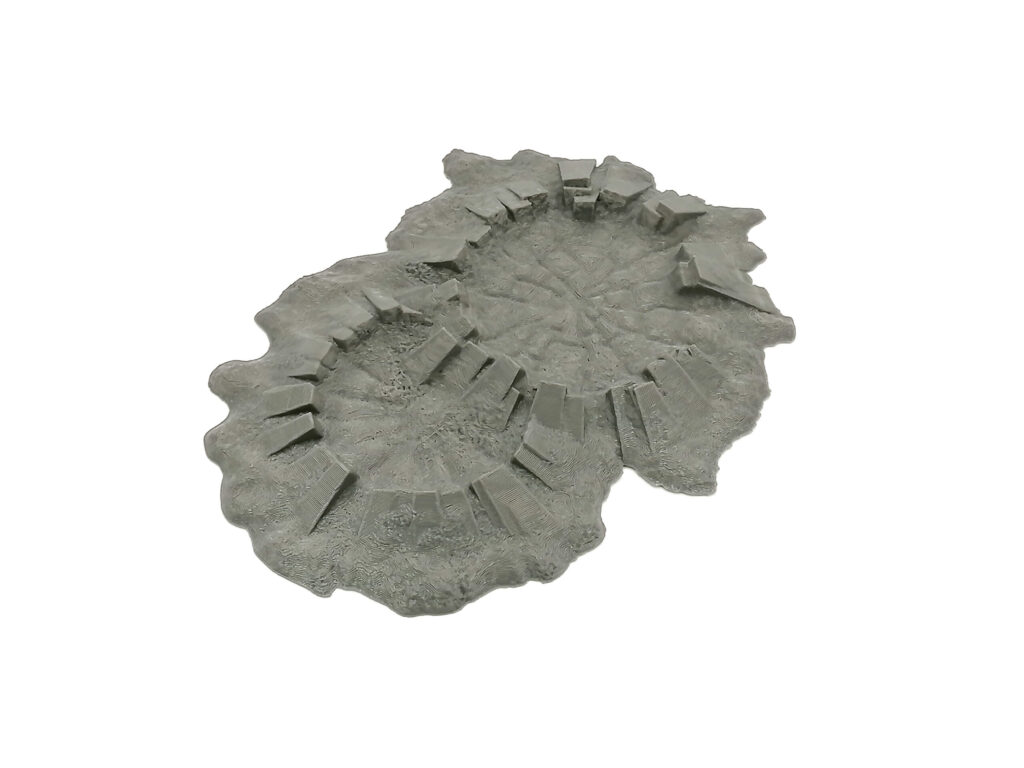 Unpainted grey 3D-printed tabletop terrain piece showing two overlapping craters with fortified ridges