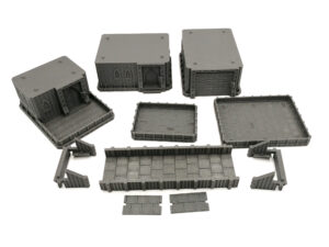 Grey 3D-printed modular tabletop terrain pieces, including gothic sci-fi buildings, platforms, and walkways
