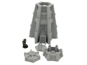 Grey 3D-printed sci-fi tower terrain set for tabletop gaming, shown next to a miniature figure for scale