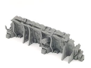 Grey 3D-printed miniature sci-fi fortification wall with control panels and a weapon station for tabletop gaming