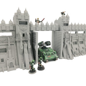 Grey 3D-printed sci-fi fortification gate and walls, shown with painted miniatures and a tank for scale