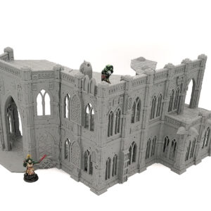 Unpainted grey 3D-printed gothic cathedral ruins for tabletop gaming, with miniatures demonstrating scale