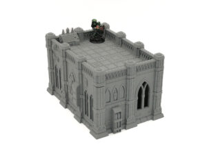Grey 3D-printed gothic building miniature with a small painted figure on the flat rooftop