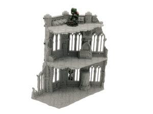 Three-storey grey 3D-printed gothic ruin terrain for tabletop gaming, with a miniature figurine for scale