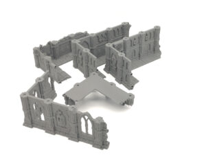 Grey modular 3D-printed Gothic ruin wall sections for tabletop miniature gaming