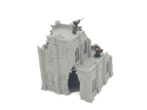 Grey 3D printed gothic ruin terrain for tabletop gaming, shown with two painted miniature figures for scale