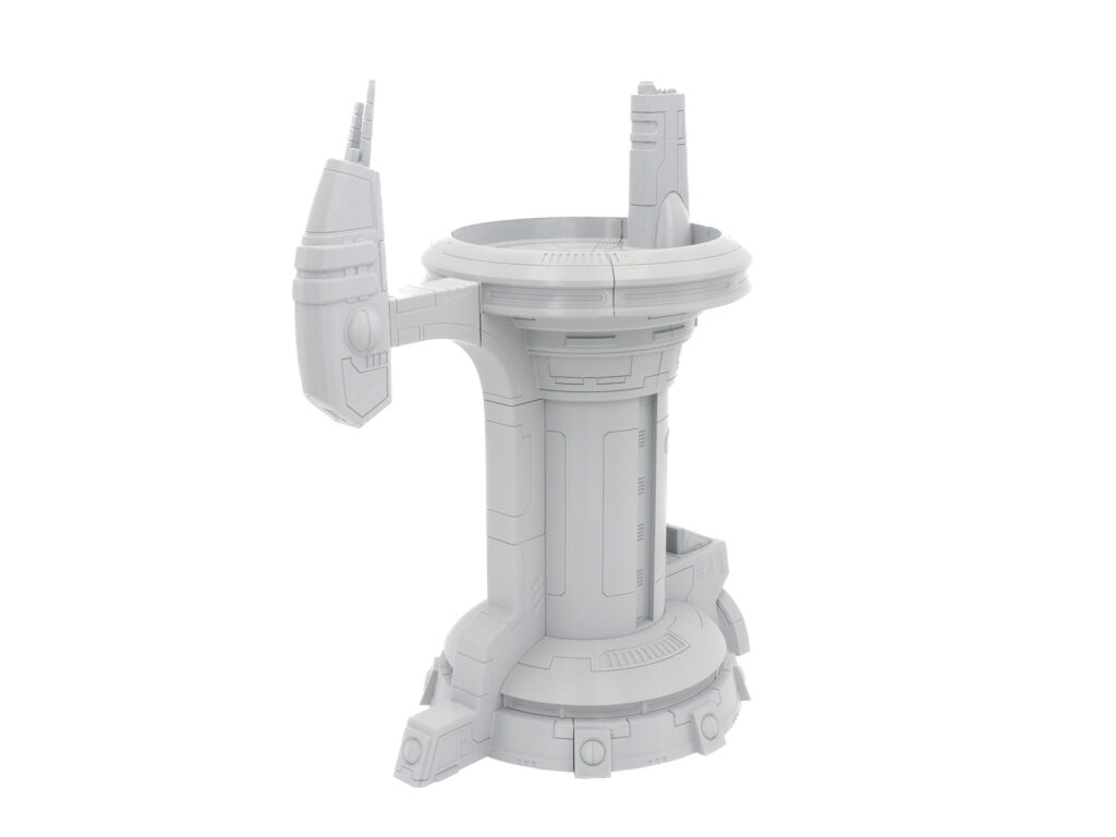Grey 3D-printed sci-fi tower miniature with a circular platform and antenna, isolated on a white background