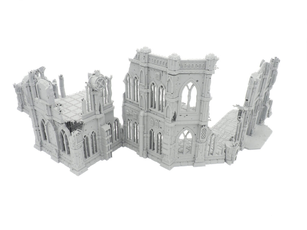 Miniature grey gothic ruins 3D printed terrain set for tabletop wargaming, shown on a white background
