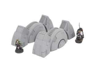 Grey 3D-printed futuristic generator terrain pieces for tabletop gaming, shown with miniatures for scale