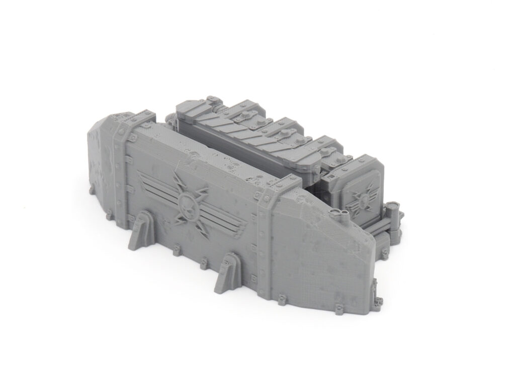 Grey 3D-printed sci-fi power generator terrain piece with industrial details for tabletop wargaming