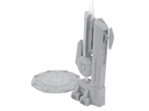 Unpainted grey 3D-printed sci-fi miniature scenery featuring a futuristic tower and a circular platform