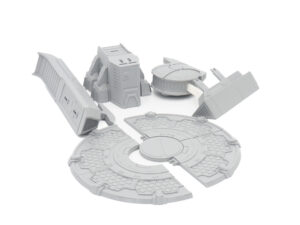 Grey 3D-printed sci-fi tabletop terrain kit, featuring modular building components and a circular landing pad