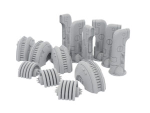 Grey 3D-printed sci-fi miniature terrain pieces, including pillars and power generators, on a white background