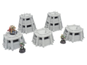 Five unpainted grey 3D-printed tabletop wargaming bunkers shown with painted miniatures for scale