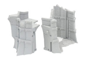 Grey 3D-printed miniature tabletop terrain pieces of ruined castle walls on a plain white background