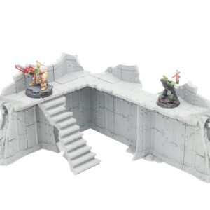 Grey 3D-printed ruined wall and stairs terrain for tabletop wargames, shown with two painted miniatures for scale