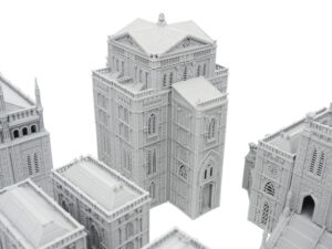 Grey 3D-printed miniature gothic cathedral buildings for tabletop gaming, on a white background