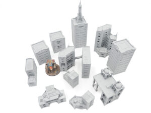 Unpainted grey 3D-printed sci-fi miniature buildings arranged on a white background with a small robot model for scale