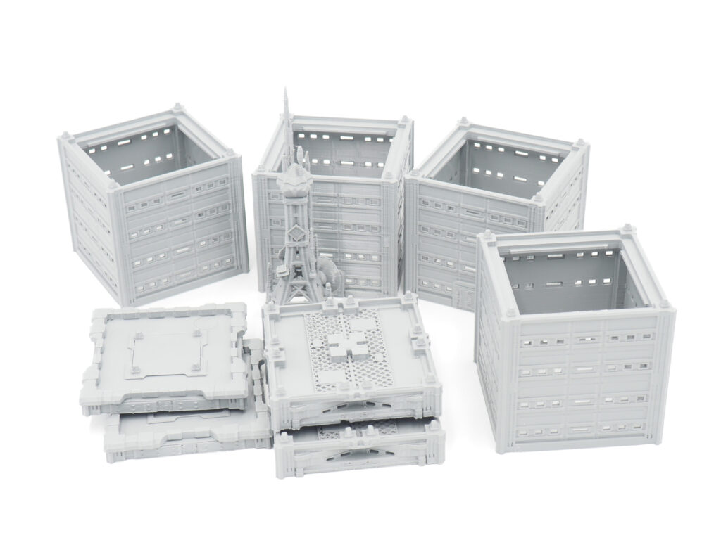Grey 3D-printed modular sci-fi buildings and communication tower miniatures for tabletop gaming