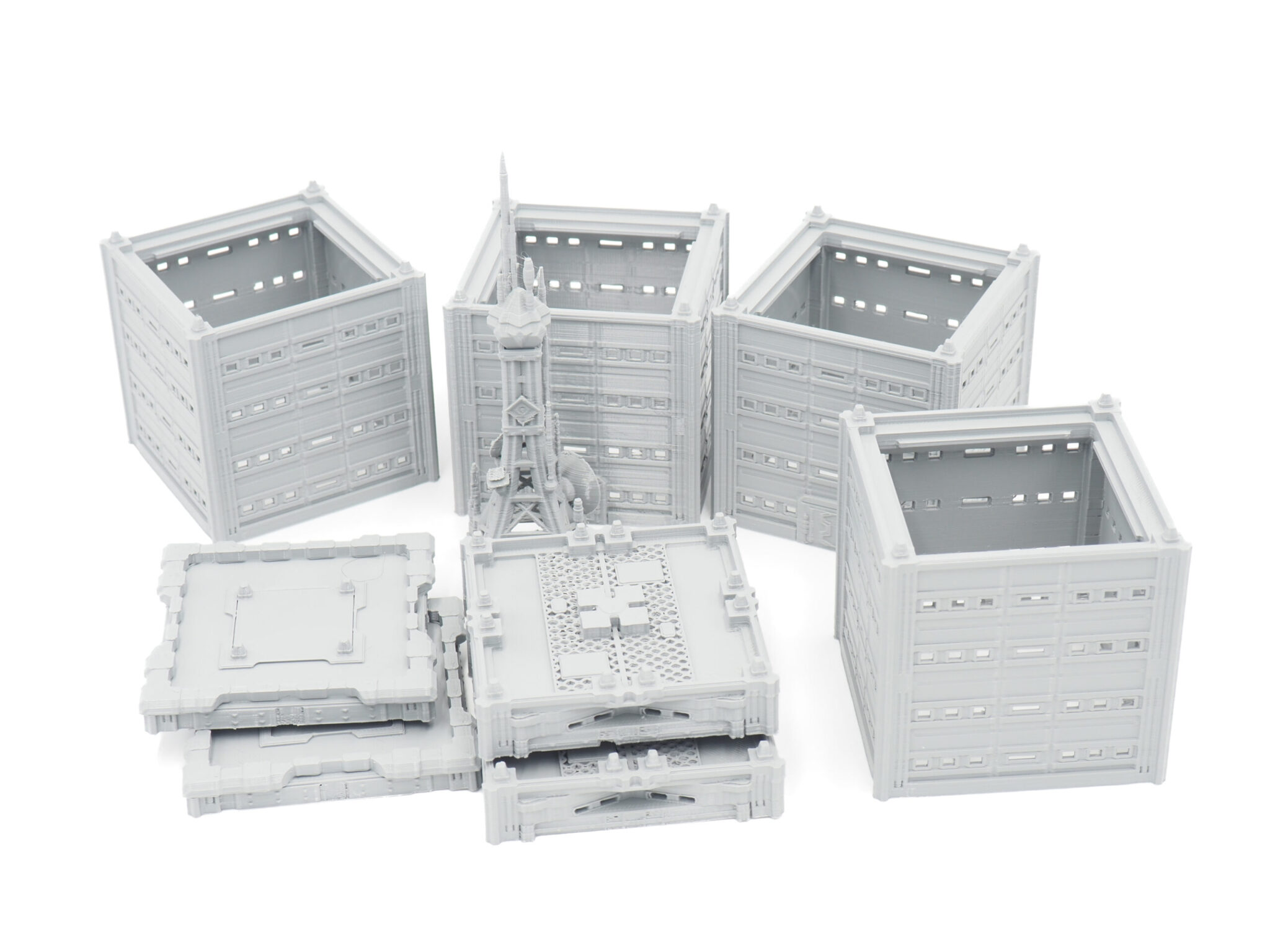 Grey 3D-printed modular sci-fi buildings and communication tower miniatures for tabletop gaming