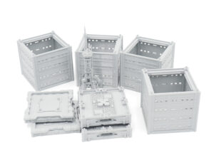 Grey 3D-printed modular sci-fi buildings and communication tower miniatures for tabletop gaming