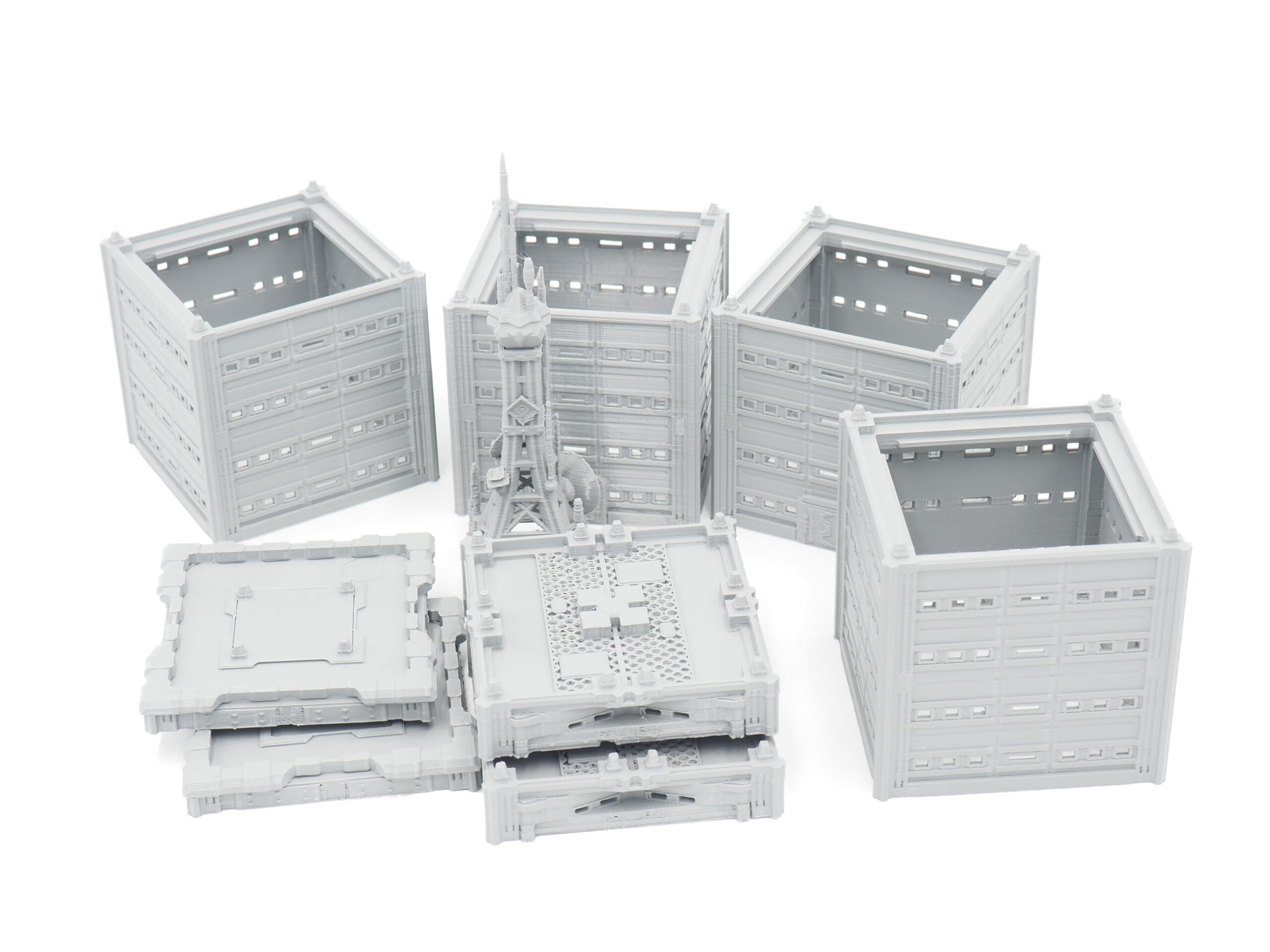 Grey 3D-printed modular sci-fi buildings and communication tower miniatures for tabletop gaming