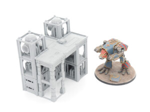Grey 3D-printed industrial terrain structure next to a painted miniature mech for scale comparison