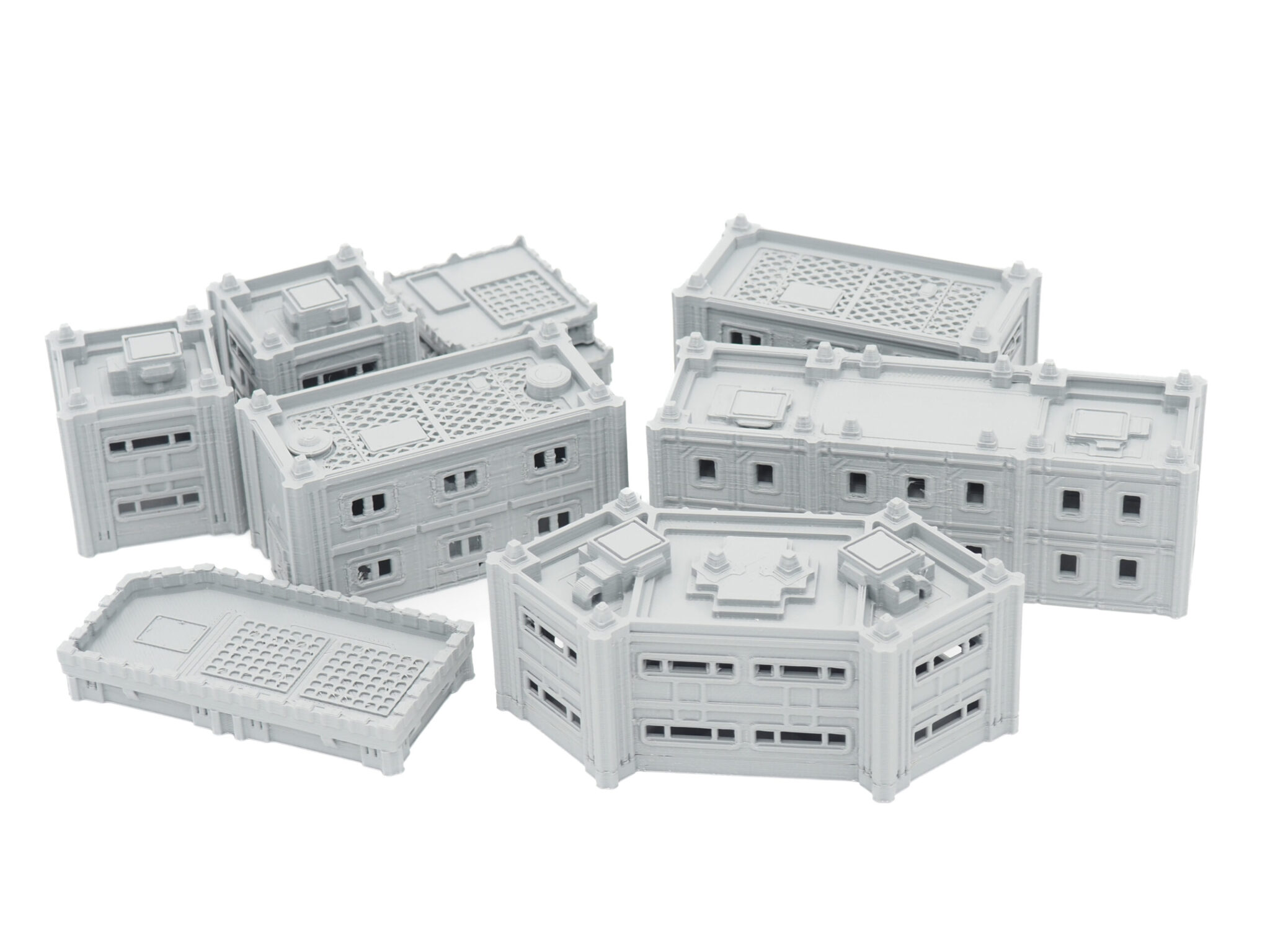 Grey 3D-printed modular sci-fi terrain and building miniatures for tabletop wargaming