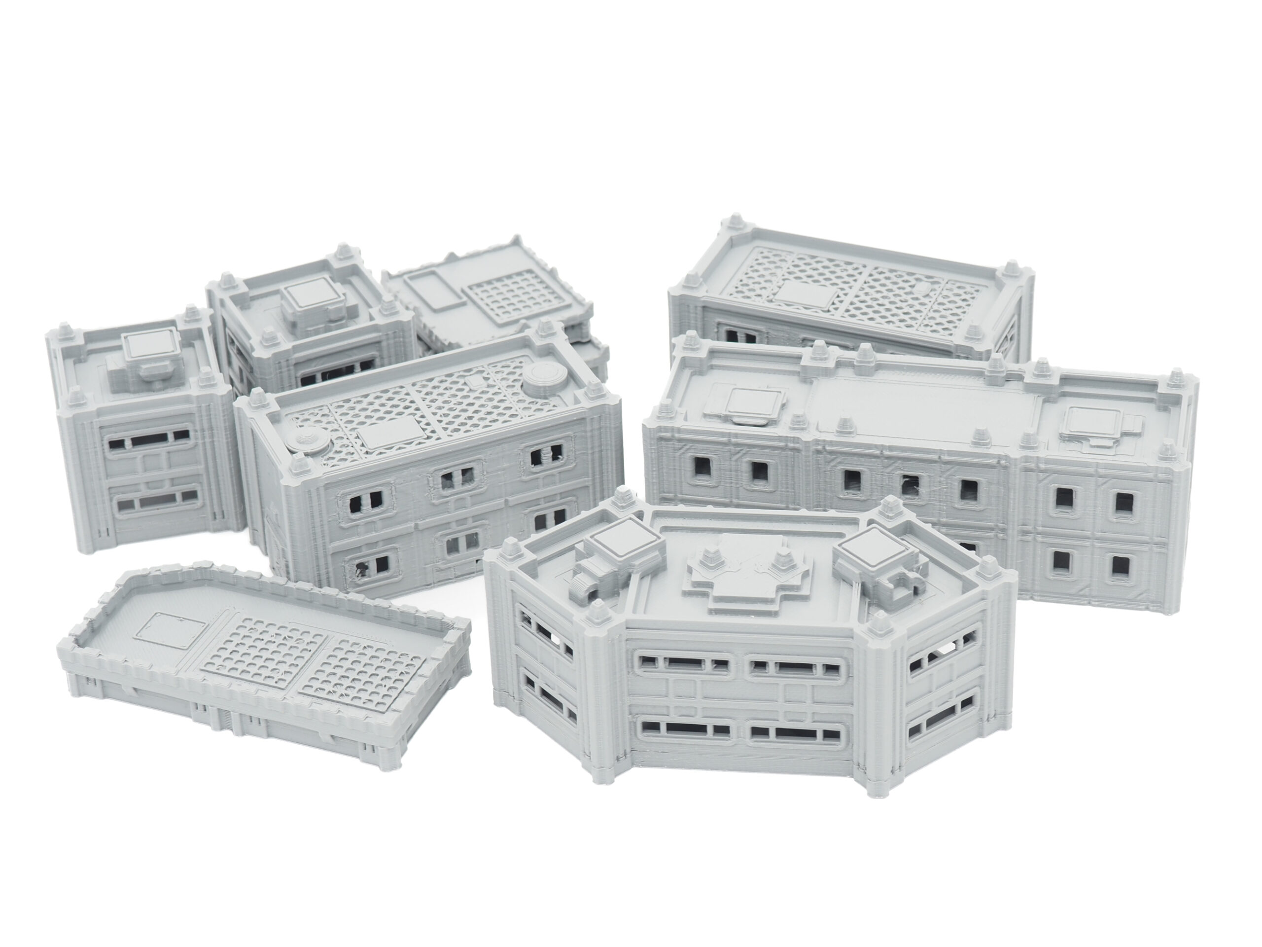 Grey 3D-printed modular sci-fi terrain and building miniatures for tabletop wargaming