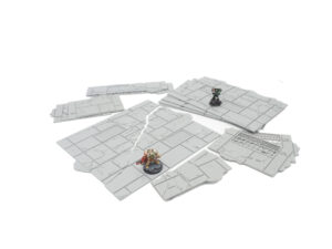 Grey 3D printed modular sci-fi floor tiles with cracked details, shown with miniature gaming figures for scale
