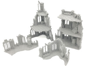 Grey 3D-printed gothic ruin terrain pieces for tabletop miniature gaming