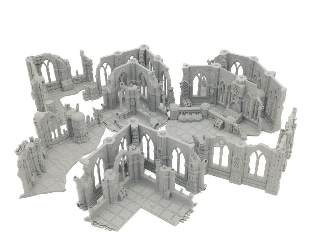 Modular grey 3D-printed gothic ruin terrain pieces featuring arched windows and textured tiled floors