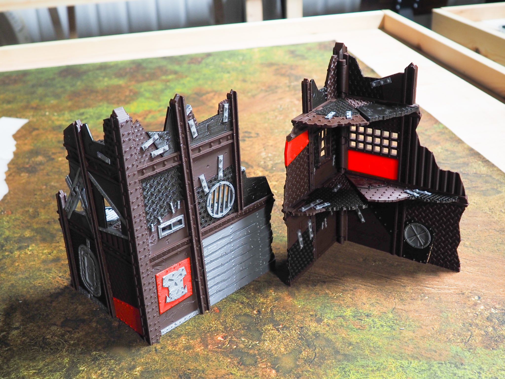 3D-printed sci-fi industrial ruins for tabletop wargaming, shown from exterior and interior angles