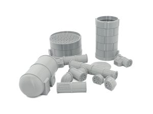 Grey 3D-printed miniature industrial terrain set featuring silos, tanks, and modular pipe sections